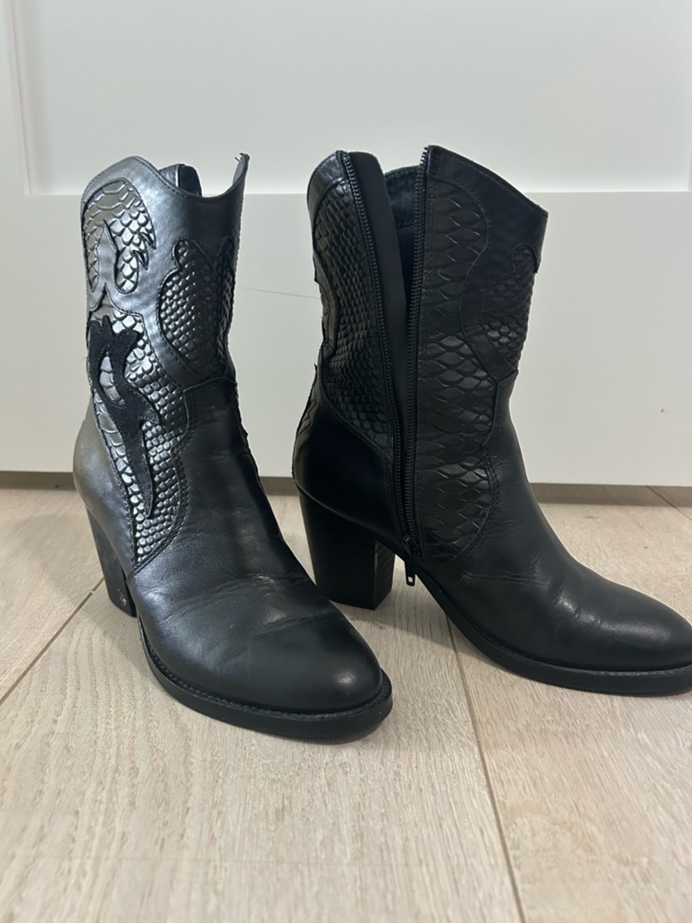 Women's Black Leather Western Ankle Boots with Embossed Snake Detail